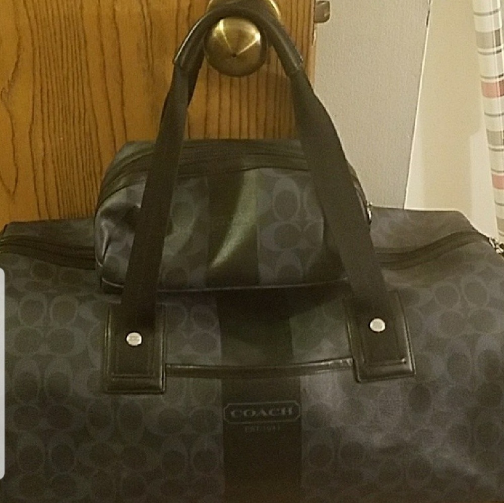 Auth. Coach travel duffle w\matching toiletry case
